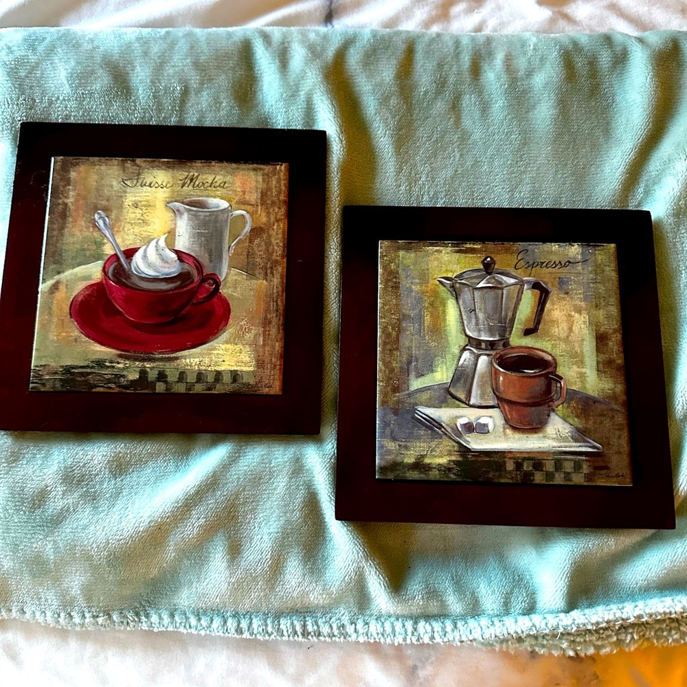 Wall decor ( has hooks on back) or trivets for hot items.